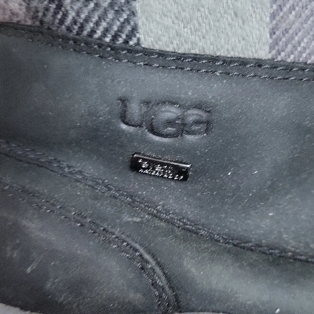 UGG Black and Gray High-Top Boots with Plush Collar
